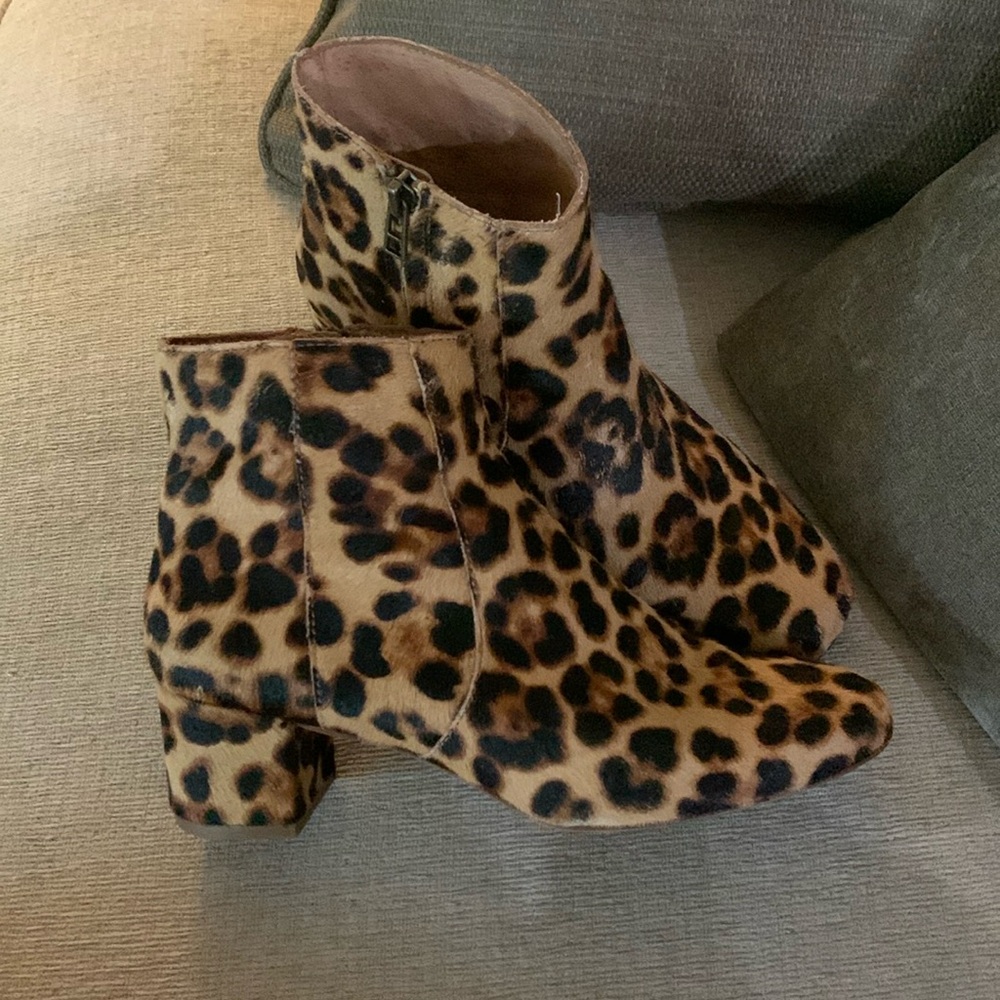 Furry leather zip booties. Excellent used condition. Leather upper and liner.